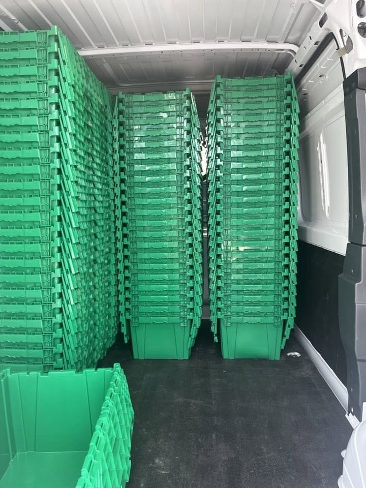 [BUSINESS NAME] delivery van loaded with moving [BOXES] in [CITY]